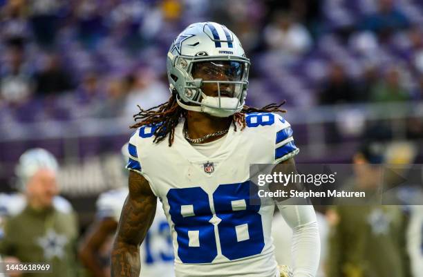 CeeDee Lamb of the Dallas Cowboys warms up before the game against the Minnesota Vikings at U.S. Bank Stadium on November 20, 2022 in Minneapolis,...