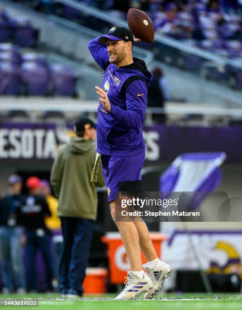 Kirk Cousins of the Minnesota Vikings warms up before the game against the Dallas Cowboys at U.S. Bank Stadium on November 20, 2022 in Minneapolis,...