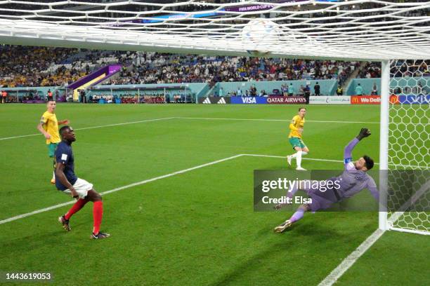 Craig Goodwin of Australia scores their team's first goal past Hugo Lloris of France during the FIFA World Cup Qatar 2022 Group D match between...