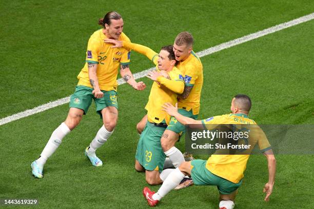 Craig Goodwin of Australia celebrates scoring his side's first goal with their teammates during the FIFA World Cup Qatar 2022 Group D match between...