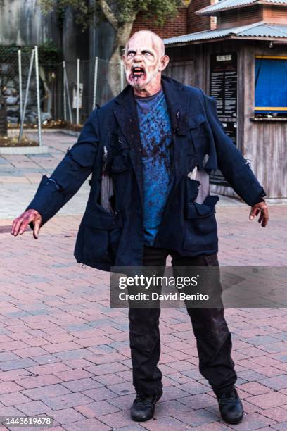 Madrid, SPAIN Actor performs as a zombie in the zombie exit of 'The Walking Dead Experience Dark Session' at the Madrid Amusement Park on November...