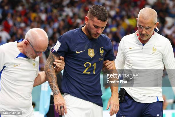 Lucas Hernandez of France is attended by medical staffs as he is substituted after an injury during the FIFA World Cup Qatar 2022 Group D match...