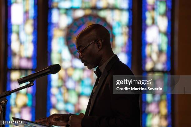 black congregation attend black baptist church service - pastor stock pictures, royalty-free photos & images