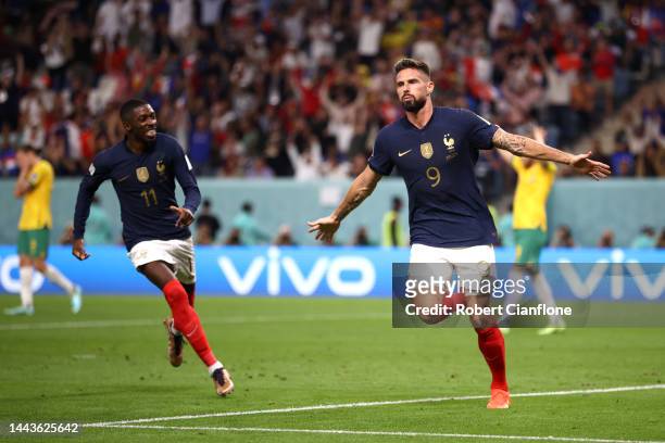 Olivier Giroud of France celebrates with Ousmane Dembele after scoring their team's second goal during the FIFA World Cup Qatar 2022 Group D match...