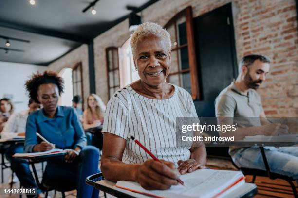 adult students in the classroom - elderly classroom stock pictures, royalty-free photos & images