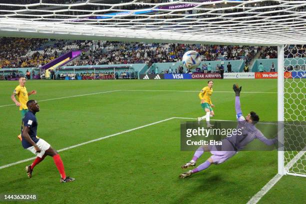 Craig Goodwin of Australia scores their team's first goal past Hugo Lloris of France during the FIFA World Cup Qatar 2022 Group D match between...
