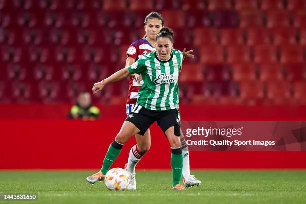 Laura Perez of Granada CF Femenino and Nuria Ligero 'Nana' of Real Betis Feminas battle for the ball during the Copa de la Reina Round of 16 match...