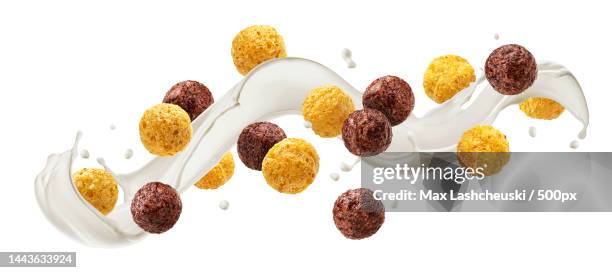 corn balls with milk splash isolated on white background - chocolate flake bildbanksfoton och bilder