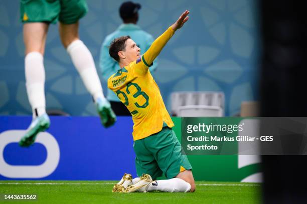 Craig Goodwin of Australia celebrates after scoring his team's first goal during the FIFA World Cup Qatar 2022 Group D match between France and...