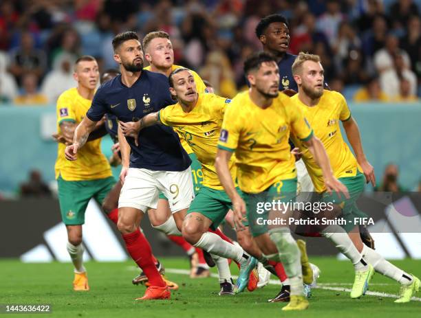 Olivier Giroud of France tussles with Australia defense during the FIFA World Cup Qatar 2022 Group D match between France and Australia at Al Janoub...