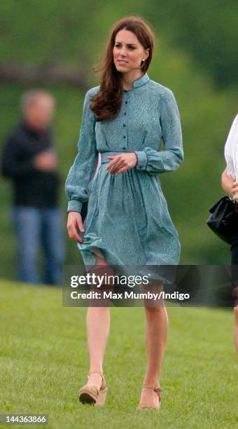 Catherine, Duchess of Cambridge attends the Audi Polo Challenge charity polo match, in which Prince William, Duke of Cambridge and Prince Harry...
