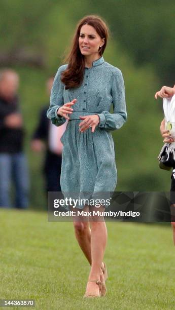 Catherine, Duchess of Cambridge attends the Audi Polo Challenge charity polo match, in which Prince William, Duke of Cambridge and Prince Harry...