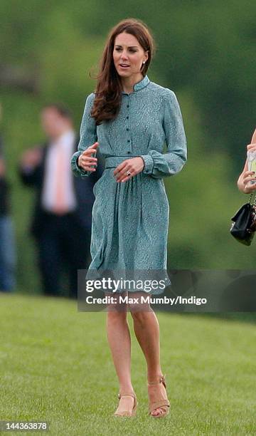 Catherine, Duchess of Cambridge attends the Audi Polo Challenge charity polo match, in which Prince William, Duke of Cambridge and Prince Harry...