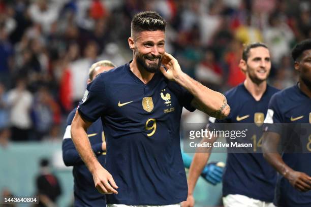 Olivier Giroud of France celebrates after scoring their team's fourth goal during the FIFA World Cup Qatar 2022 Group D match between France and...