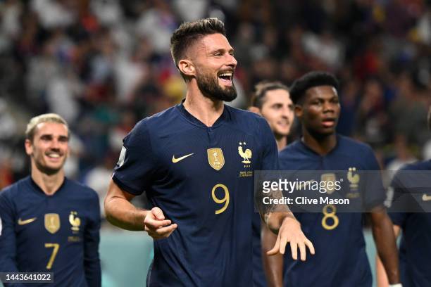 Olivier Giroud of France celebrates after scoring their team's fourth goal during the FIFA World Cup Qatar 2022 Group D match between France and...