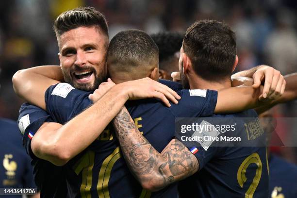 Olivier Giroud of France celebrates with teammates after scoring their team's fourth goal during the FIFA World Cup Qatar 2022 Group D match between...