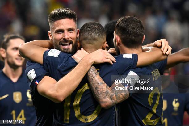 Olivier Giroud of France celebrates with teammates after scoring their team's fourth goal during the FIFA World Cup Qatar 2022 Group D match between...