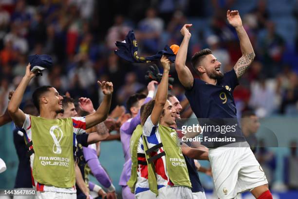Olivier Giroud of France leads the celebrations following the final whistle, as his brace helped the side to a 4-1 victory in the FIFA World Cup...
