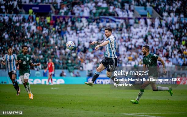 Lionel Messi of Argentina jumps to the ball during the FIFA World Cup Qatar 2022 Group C match between Argentina and Saudi Arabia at Lusail Stadium...