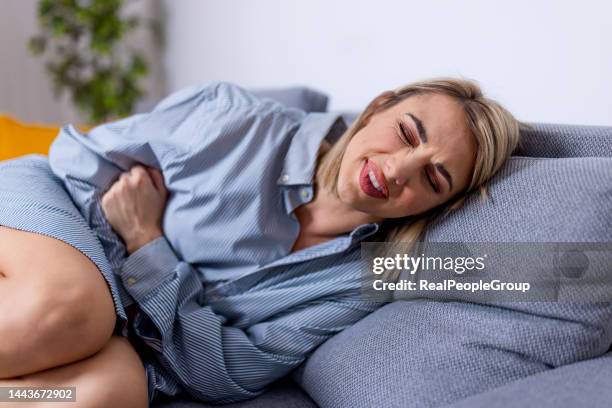 painful menstruation - appendicitis stock pictures, royalty-free photos & images
