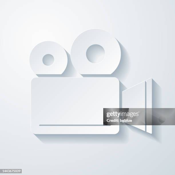 movie camera. icon with paper cut effect on blank background - vintage television white background stock illustrations