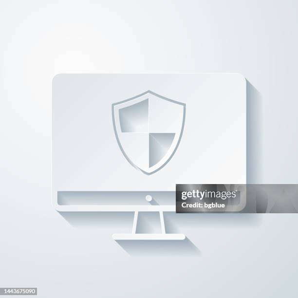 desktop computer with shield. icon with paper cut effect on blank background - desktop computer white background stock illustrations