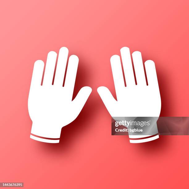protective rubber gloves. icon on red background with shadow - single use gloves stock illustrations