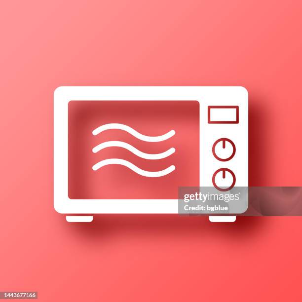 microwave oven. icon on red background with shadow - microwave stock illustrations