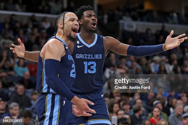 Jaren Jackson Jr. #13 and Dillon Brooks of the Memphis Grizzlies react during the first half against the Sacramento Kings at FedExForum on November...