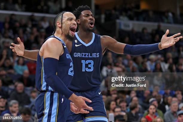 Jaren Jackson Jr. #13 and Dillon Brooks of the Memphis Grizzlies react during the first half against the Sacramento Kings at FedExForum on November...