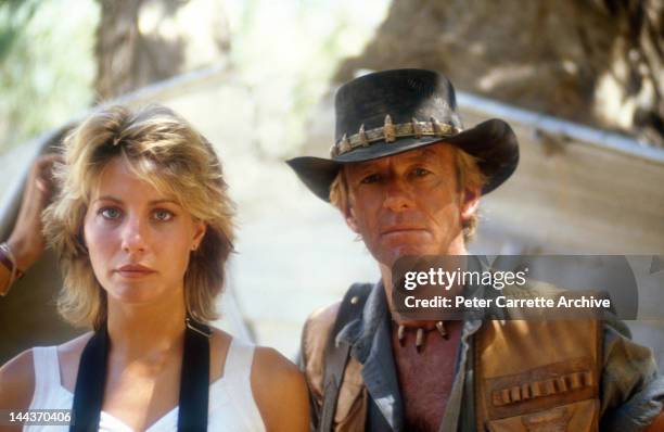 Actors Linda Kozlowski and Paul Hogan on the set of their new film 'Crocodile Dundee' in 1986 on location in the Northern Territory, Australia.