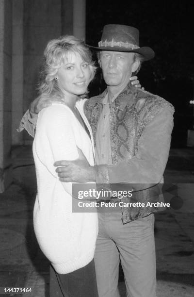 Actors Linda Kozlowski and Paul Hogan on the set of their new film 'Crocodile Dundee' in 1986 in New York City.