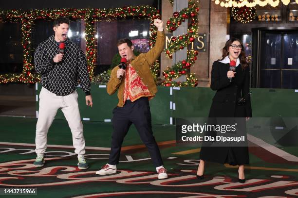 Flula Borg, Adam Devine and Sarah Hyland perform during the rehearsals for the 96th Macy's Thanksgiving Day parade at Macy's Herald Square on...