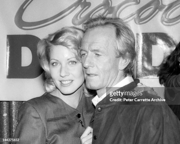 Actors Linda Kozlowski and Paul Hogan attend a press conference to promote their new film 'Crocodile Dundee II' in 1988 in Sydney, Australia.