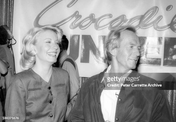 Actors Linda Kozlowski and Paul Hogan attend a press conference to promote their new film 'Crocodile Dundee II' in 1988 in Sydney, Australia.