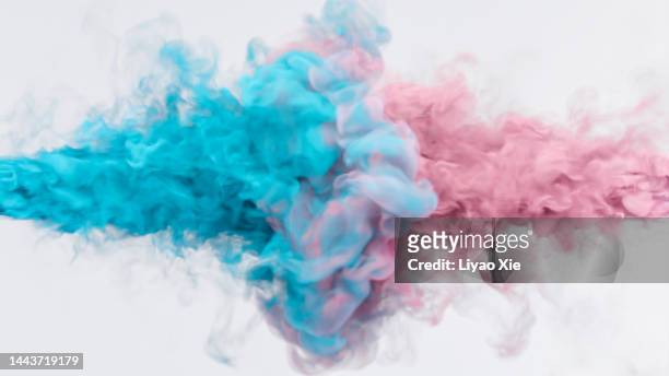 multicolor liquid impact - face off fotografías e imágenes de stock