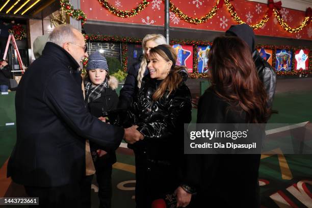Emilio Estefan, Paula Abdul and Gloria Estefan greet during the rehearsals for the 96th Macy's Thanksgiving Day parade at Macy's Herald Square on...