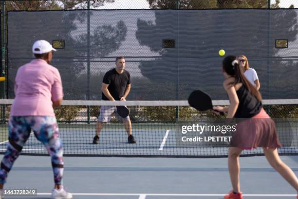 pickleball - doubles stock pictures, royalty-free photos & images