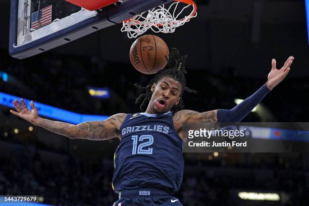 Ja Morant of the Memphis Grizzlies dunks during the second half against the Sacramento Kings at FedExForum on November 22, 2022 in Memphis,...
