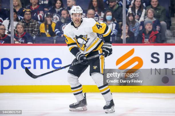 Jan Rutta of the Pittsburgh Penguins keeps an eye on the play during first period action against the Winnipeg Jets at the Canada Life Centre on...