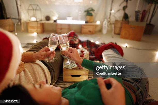 cheers to us! - christmas movie stock pictures, royalty-free photos & images