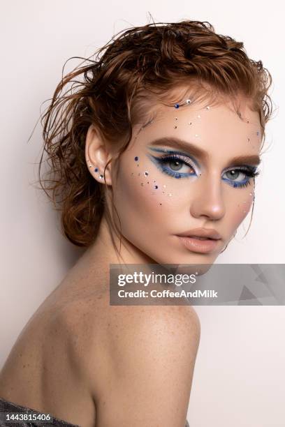 beautiful woman with bright make-up - blue lips stock pictures, royalty-free photos & images