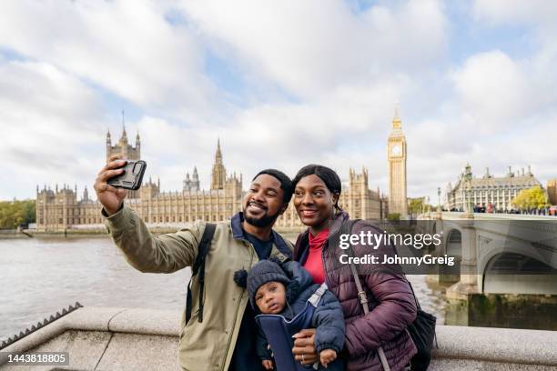 tourists taking selfie during london vacation - big ben selfie stock pictures, royalty-free photos & images