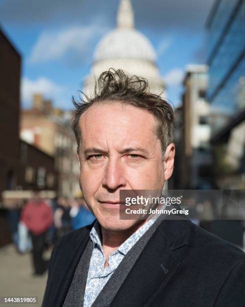 sunny outdoor portrait of serious british man - st pauls london stock pictures, royalty-free photos & images