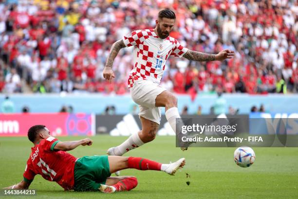 Marcelo Brozovic of Croatia is tackled by Abdelhamid Sabiri of Morocco during the FIFA World Cup Qatar 2022 Group F match between Morocco and Croatia...