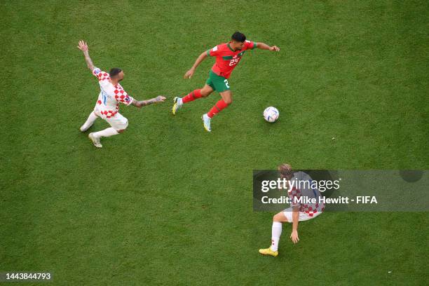 Yahya Attiat-Allah of Morocco controls the ball against Marcelo Brozovic of Croatia during the FIFA World Cup Qatar 2022 Group F match between...