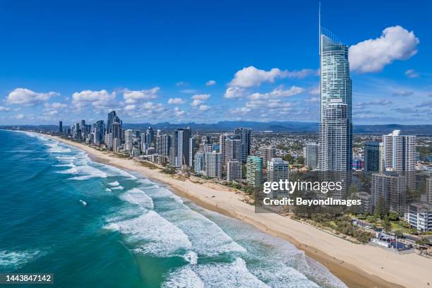 aerial view surfers paradise foreshore & skyline from pacific ocean looking south to broadbeach - gold coast skyline stock pictures, royalty-free photos & images