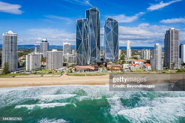 aerial front view surfers paradise foreshore high-rise buildings from above pacific ocean - gold coast australia stockfoto's en -beelden