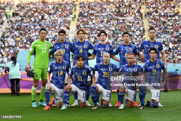Japanese players line up for the team photos prior to the FIFA World Cup Qatar 2022 Group E match between Germany and Japan at Khalifa International...