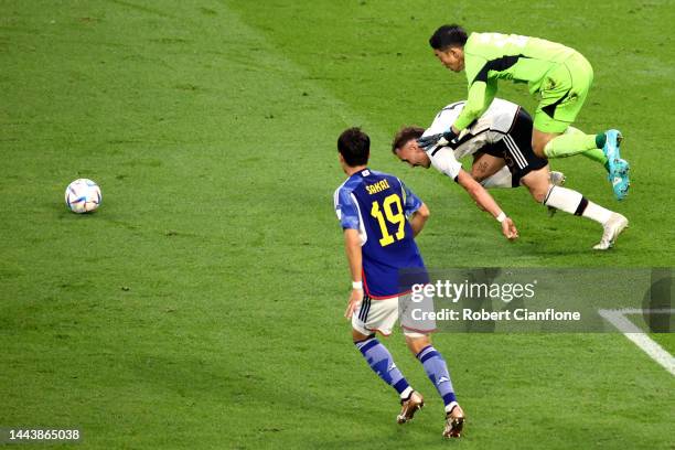 David Raum of Germany is fouled by Shuichi Gonda of Japan resulting in a penalty during the FIFA World Cup Qatar 2022 Group E match between Germany...